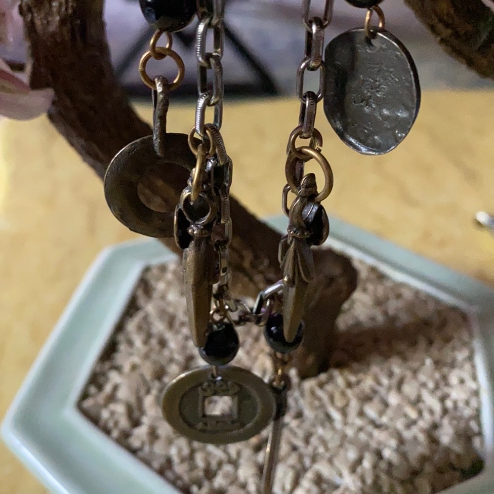 Antique sterling coin charms bracelet